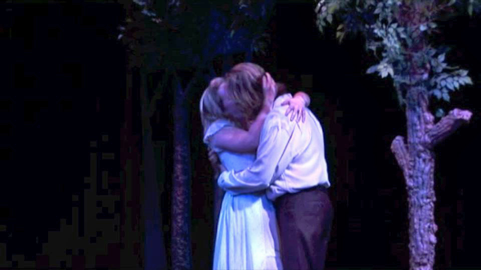 The Newlyweds kiss